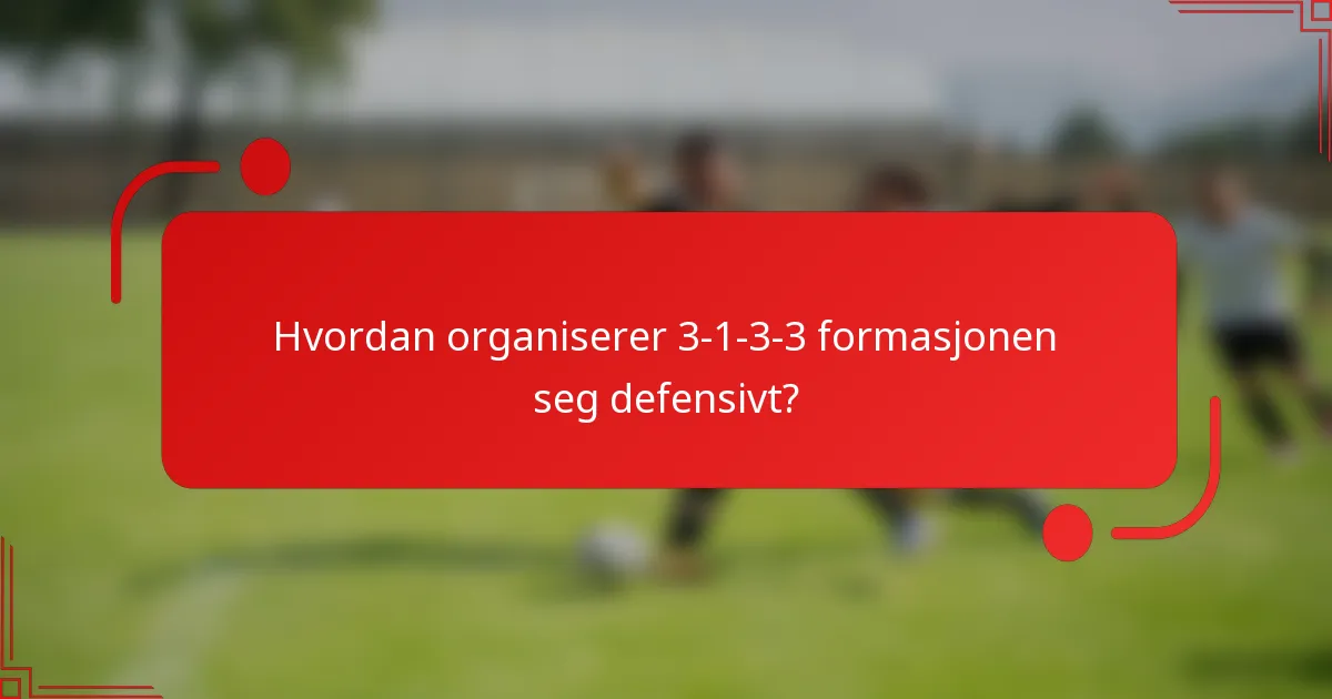 Hvordan organiserer 3-1-3-3 formasjonen seg defensivt?